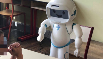 robot helping children with autism with joint attention