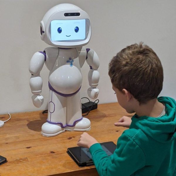 QTrobot interacting with child at home