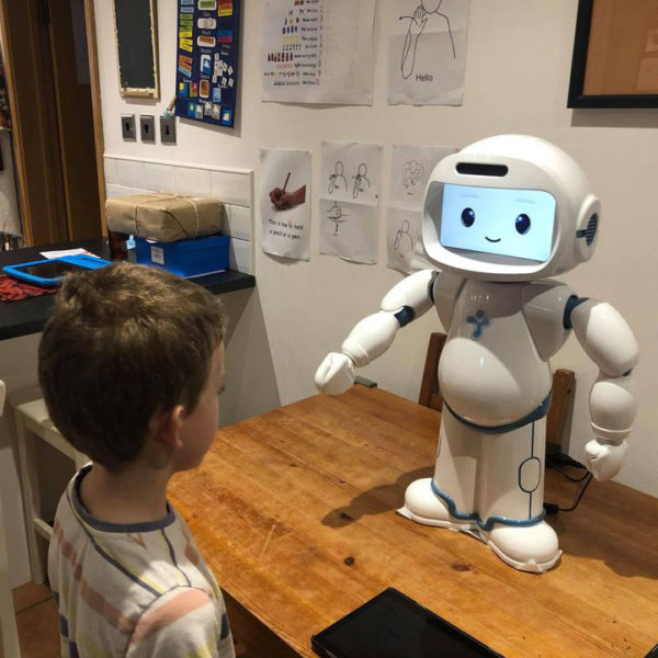 QTrobot interacting with child at home
