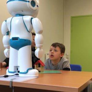 Robot Helping Children With Autism To Focus By Behaving Simple And ...