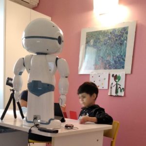 effectiveness of robot vs tablet for autism speech therapy