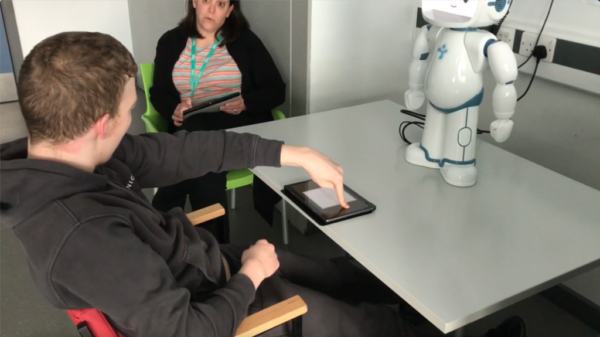 QTrobot Helping learners with autism at Bridge College with triangular interaction exercises