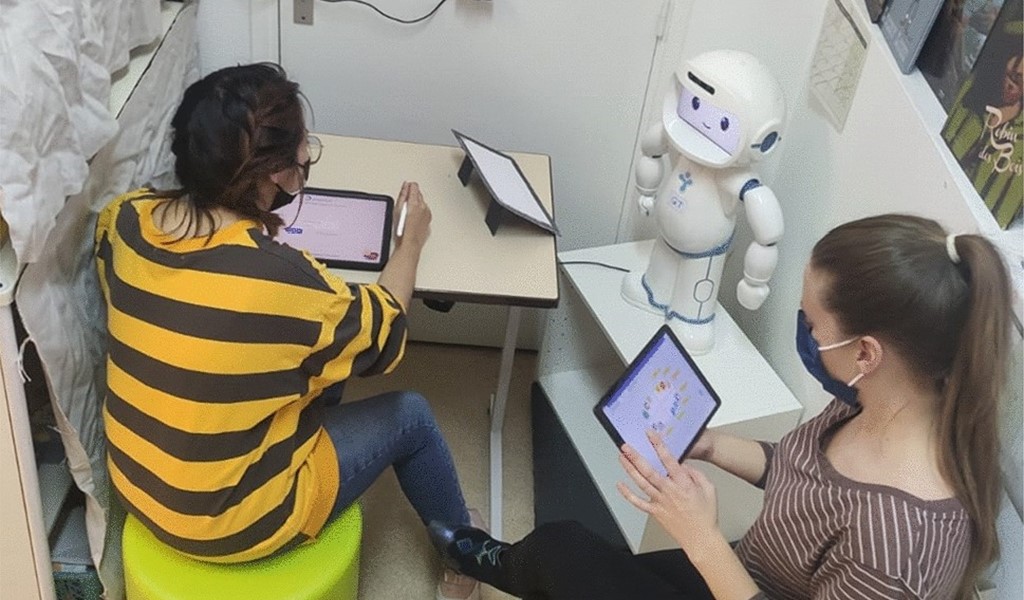 A Rehabilitation Robotic Companion for Children and Caregivers: The Collaborative Design of a Social Robot for Children with Neurodevelopmental Disorders
